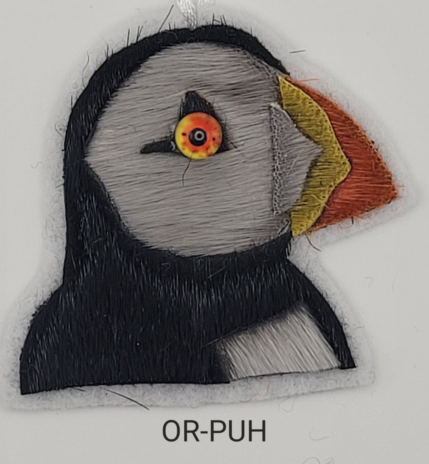 Seal skin puffin head ornament OR-PUH
